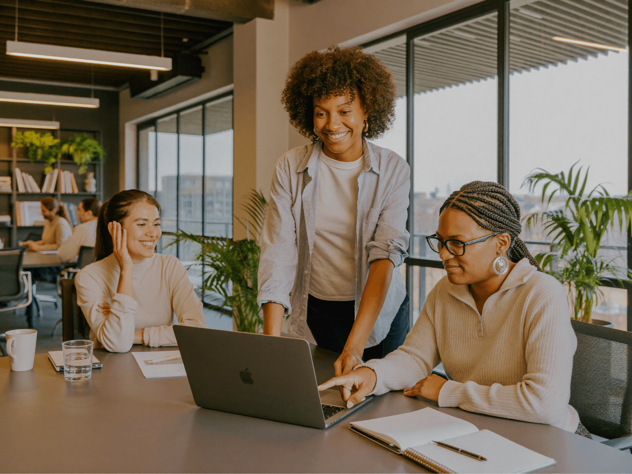 A brokerage team reviewing referral activity together